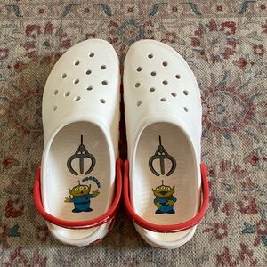 Toy Story crocs. Men’s size 10 women’s size 12. Good condition